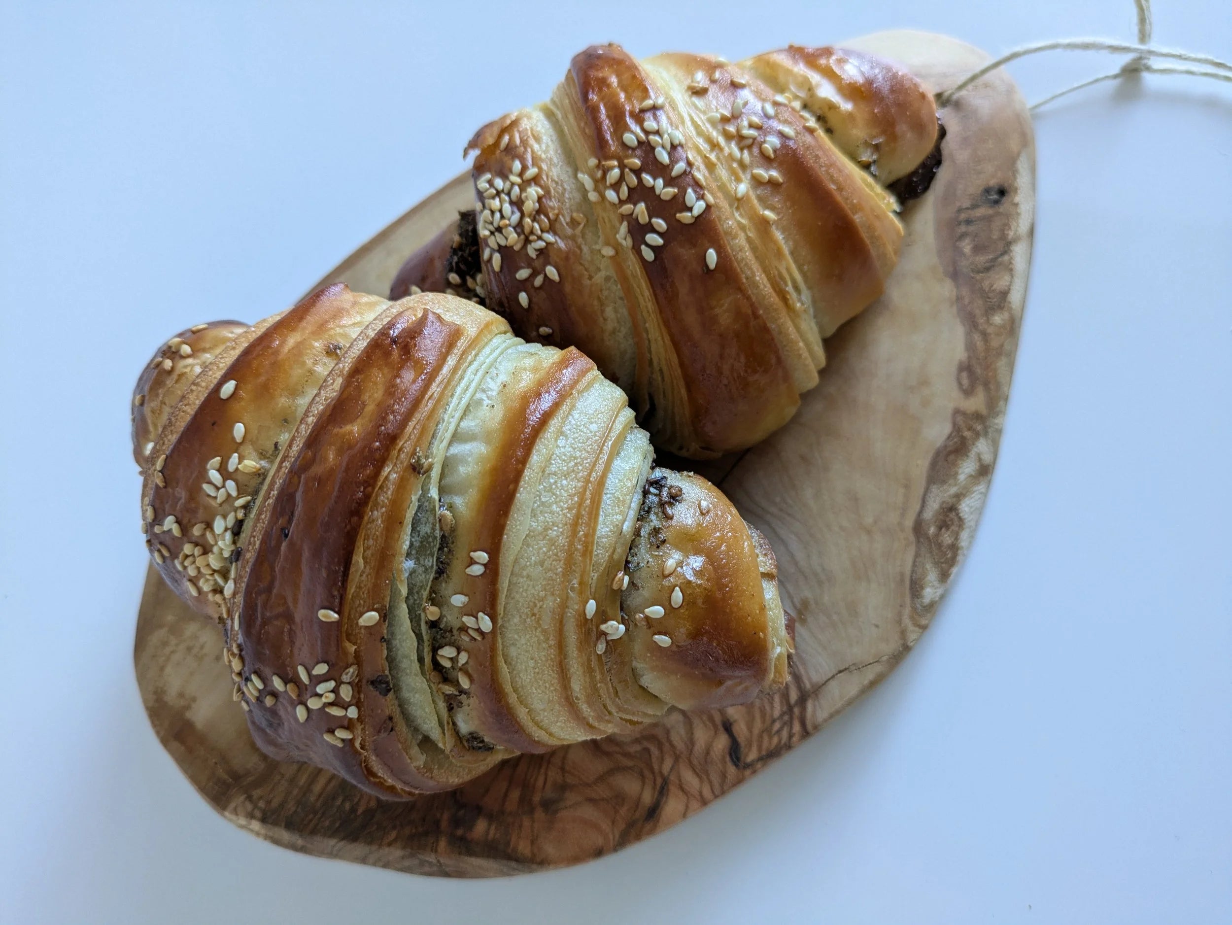 Golden croissants seasoned with za’atar and sesame