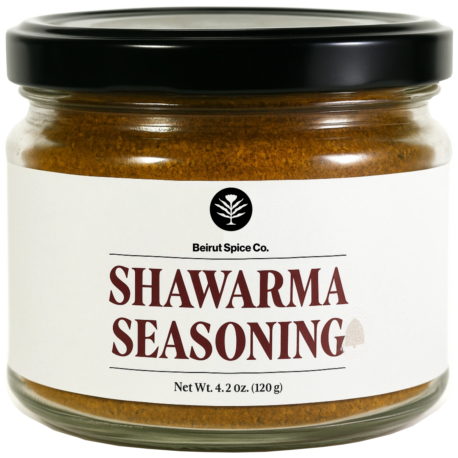 Lebanese shawarma seasoning in a Beirut Spice Co jar on a stone slab.